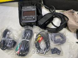 Sony HXR-MC1P mini camera and digital HD Video recorder and accessories